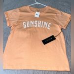 Orange pullover. New with tag. Brand Love Dazed. Size L. Size L Photo 3