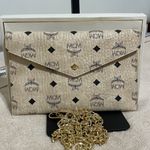MCM Novelty Item Cream and Black Logo Clutch Photo 10