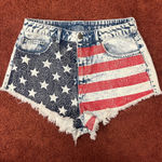 Divided American flag Jean shorts Photo 0