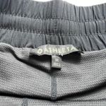 Athleta  Skort Black Medium Athletic Skirt with Shorts Pockets Drawstring Womens Photo 1