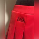 EUC Spencer’s Red and Black B**** Pleated Cheer Skirt size large Photo 1
