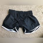 Nike  Shorts Women’s Size Medium Black with White Stripe Athletic Running. Photo 7