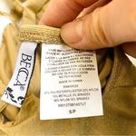 Becca gold metallic deep V neck low-back onepiece Photo 4