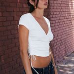 Brandy Melville John Galt White Short Sleeve Cinched Cotton Wrap Top Photo 1
