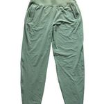Athleta green Run with It jogger wind pants size S Photo 0