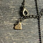 Cookie Lee Antiqued Brass and Green Gemstone Cross Necklace Photo 1