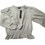 Almost Famous Women’s Peplum Top  Photo 1