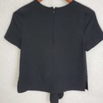 Kensie Womens Blouse Size XS Black Front Tie Side Slit Back Zip Short Sleeve Photo 1