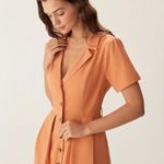 Rihoas Orange V Neck Pleated Button Midi Dress Photo 1
