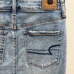 American Eagle  high rise light wash distressed stretch denim mini skirt 2 NWT Photo 7
