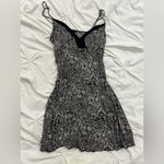 Elegant Black and White Snake Print Dress Photo 1