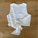 L'Academie L’Academie - Wrap Side Tie Sleeveless Vest in White Photo 2