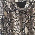 Isabella Rodriguez FINAL MARKDOWN  Elegant ladies top large Photo 1