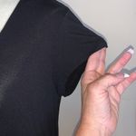 Polly & Esther Boutique purchase from Nashville, TN. Lace up front. Flows, high low hem. Photo 2