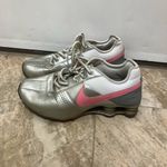 Nike Shox Deliver Women’s Athletic Sneaker metallic silver and pink Photo 1