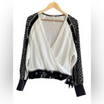 Free People  Auxton Thermal Wrap Top with a floral print Photo 2