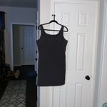 Alyn Paige  Elegant Black Mini Dress Photo 1