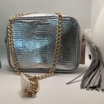 Victoria's Secret Victoria Secret purse/elegant bag. New with tags. Purse is silver. Strap is gold Photo 6
