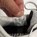 Nike  Women's Sneakers in Black and White Photo 2