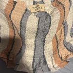 Ocean Drive  beachy pink and blue ruffled top with bow shoulder ties! Photo 1