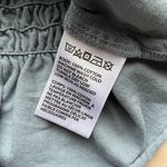 Urban Outfitters Off-the-shoulder Smocked Top Photo 3