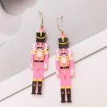 Boutique Handmade pink and black wooden nutcracker earrings with gold accents #holiday Photo 0