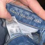 American Eagle light wash destroyed relaxed mom jeans Photo 1