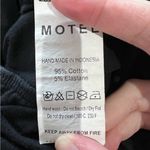 Motel  Women’s Black Cinched Bootcut Leggings Photo 3