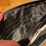 Juicy Couture Wristlet with Phone Charger in Holographic Gold Photo 4