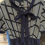 SheIn  pleated skirt puff sleeve dress with bow tie detail size medium navy Photo 2