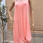 Xersion Version Neon Apricot Cover. Ties at hemline. Size M Photo 0