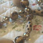 Joan Rivers  gorgeous animal print necklace. The beads are wooden.​ Photo 4