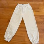 Brandy Melville  White Rosa Sweatpants Photo 1