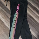 Bebe Black Joggers with Rainbow Stripe Photo 0