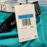 Nike NWT  Women Fusion Logo Tape Kickshort medium Photo 7