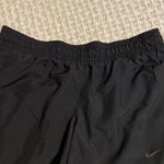 Nike  womens dri fit black and white running shorts size S Photo 3