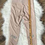 PINK - Victoria's Secret  Ultimate pale pink leggings size small Photo 4
