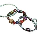 Set of three bracelets, red, pink, purple silver Photo 0