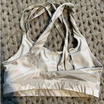 Athleta sports bra cream/grey camo size small Photo 1