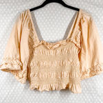 Free People  Peach Smocked Bell Sleeve Crop Top Photo 0