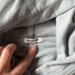 We Wore What  HOODIE Photo 1