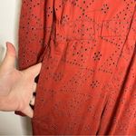 Free People rust colored eyelet jumpsuit zip up size 4β Photo 6