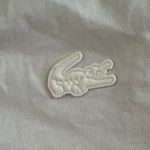 Lacoste  Women’s Contrast Bands T-shirt size small medium 32 Photo 3