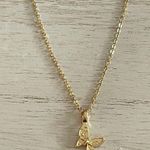 Dainty gold tone butterfly necklace Photo 4