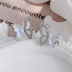 Embark on a whimsical journey with our Pairs Fairy Style Sweet Start Earrings. Gray Photo 2