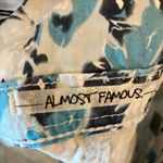 Almost Famous White Denim Floral Shorts Photo 11