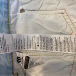 Levi's 501 Original Fit High Rise Cutoff Raw Hem Light Wash Shorts in Ojai Lake Photo 14