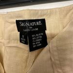 Larry Levine  Signature Dress Trousers are a size 12. Photo 2