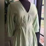 COS  voluminous v-neck light green midi dress, size 8 Photo 3