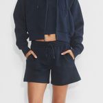 Aritzia  TNA Sweatfleece Cozy Fleece Boyfriend Short  Photo 0